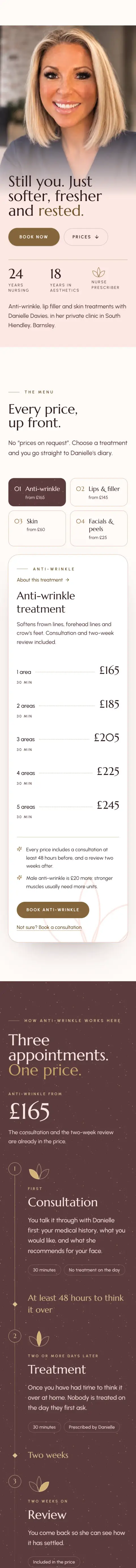 Derma Aesthetics website on a phone